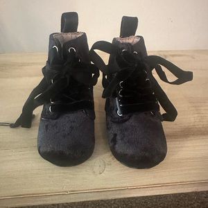 A Bear Co. size 2c combat boots.